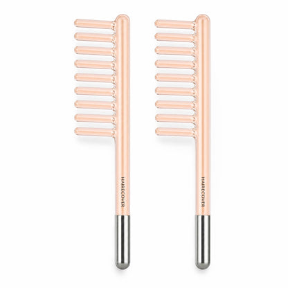 Two HAIRECOVER glass comb electrodes side by side, comb plus spare, on white